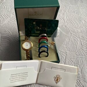- Gucci bangle watch